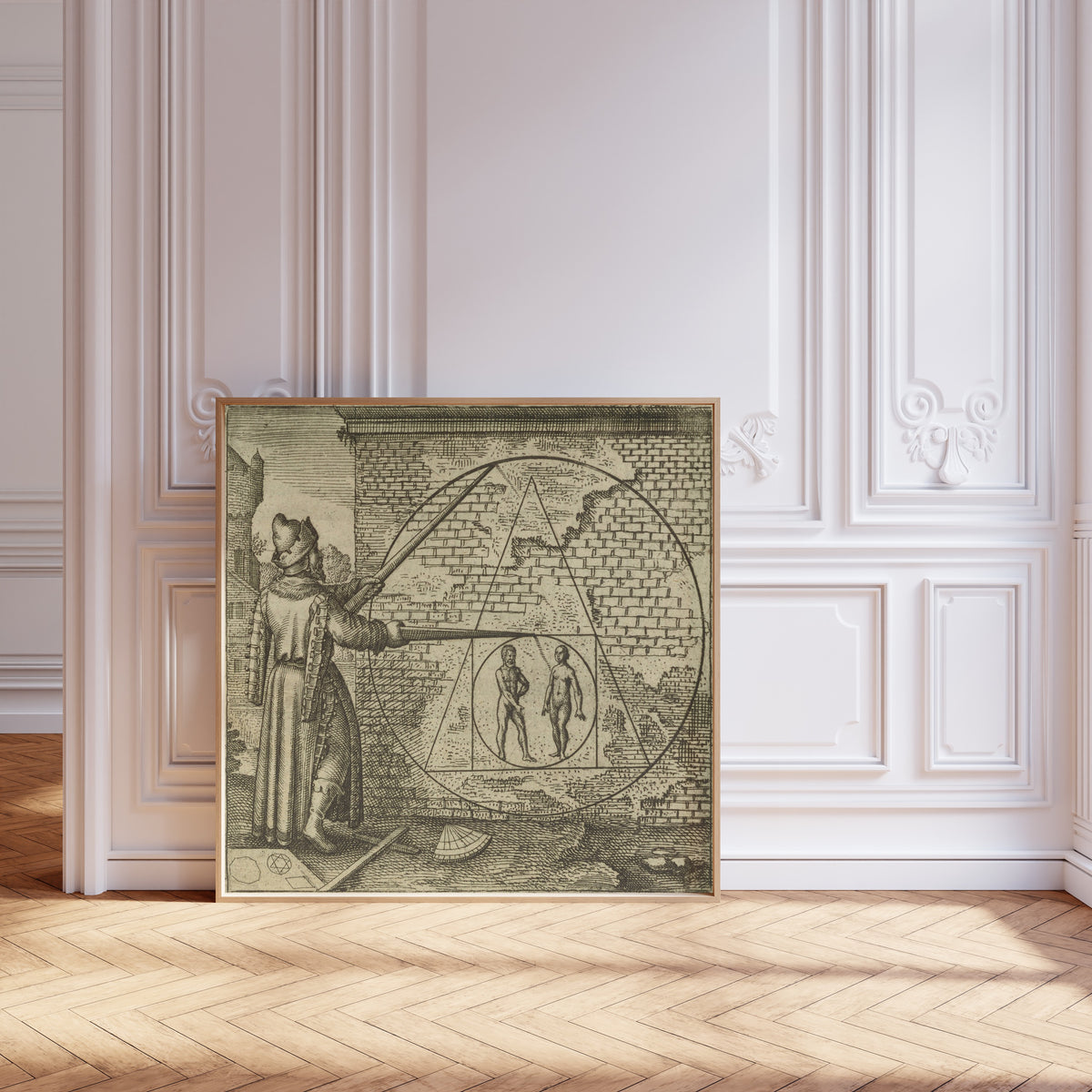 Framed art print of Atalanta Fugiens, Emblem 21: Make a Circle from Man and Woman by Michael Maier, leaning against pale pink panelling on a herringbone floor