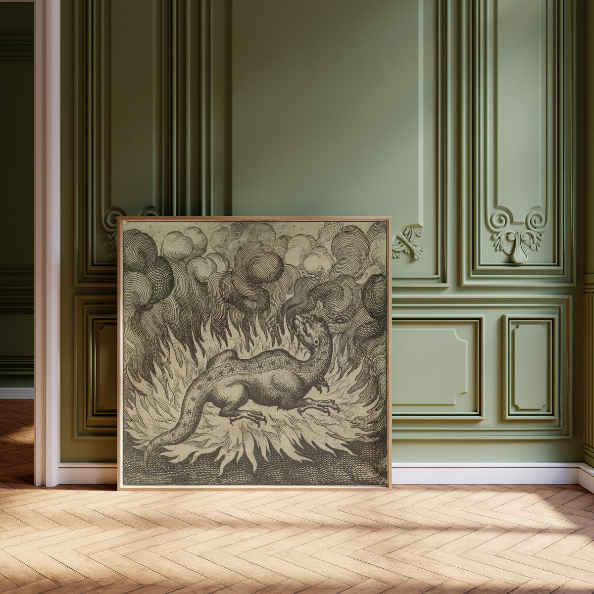 Framed art print of Atalanta Fugiens, Emblem 29: As the Salamander Lives in… by Michael Maier, leaning against olive-green panelling on a herringbone floor