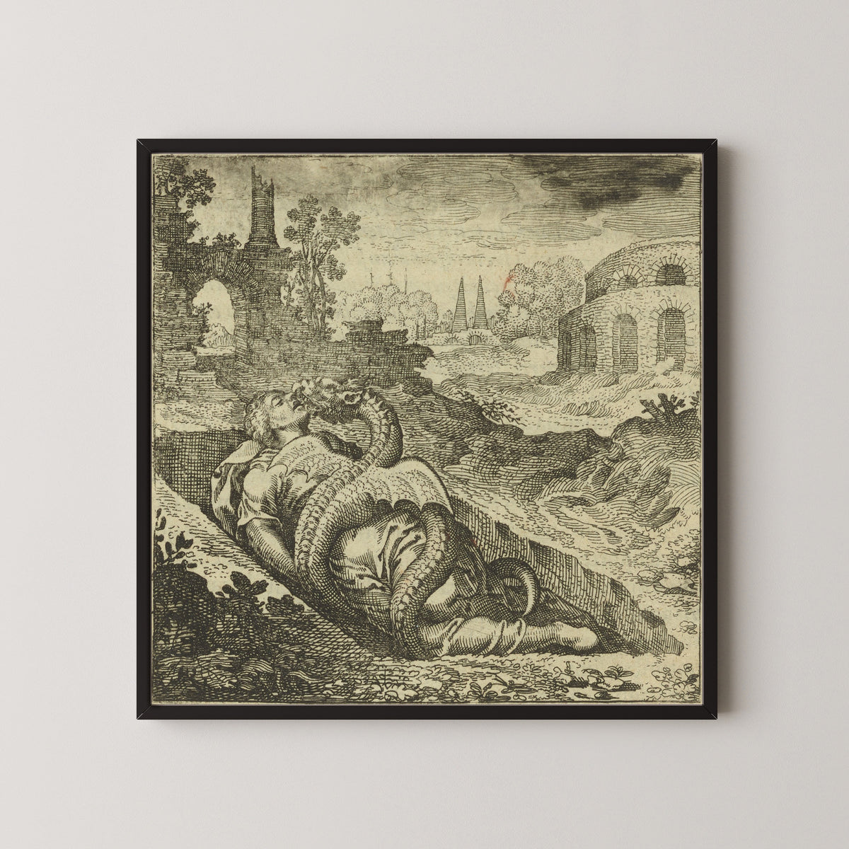 Framed art print of Atalanta Fugiens, Emblem 50: The Dragon Kills the Woman, and She Kills It by Michael Maier, in a black frame on a pale wall