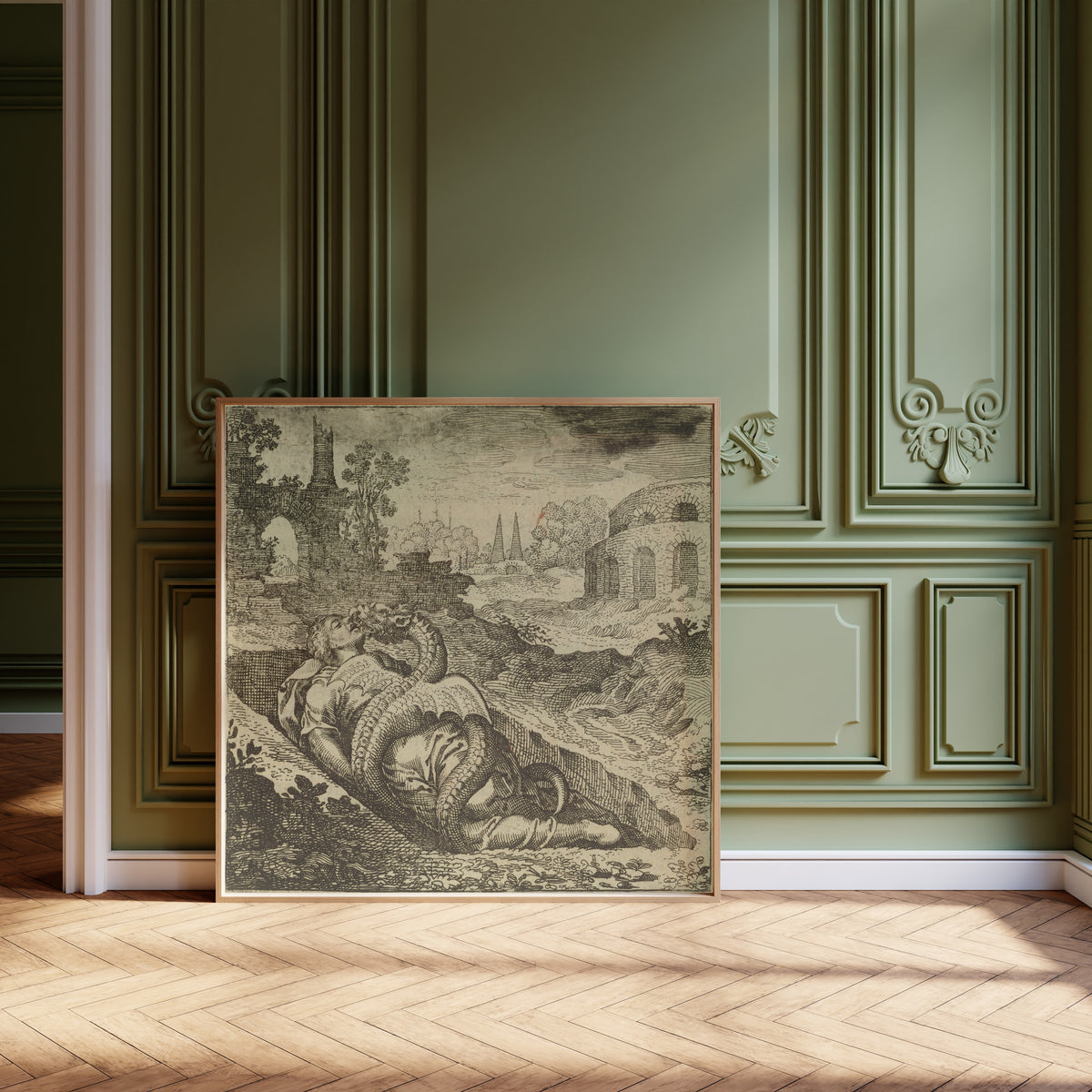 Framed art print of Atalanta Fugiens, Emblem 50: The Dragon Kills the Woman… by Michael Maier, leaning against olive-green panelling on a herringbone floor