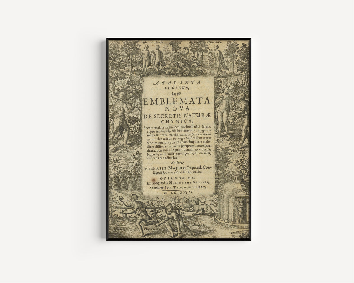 Framed art print of Atalanta Fugiens, Title Page by Michael Maier, in a slim black frame on a plain white wall