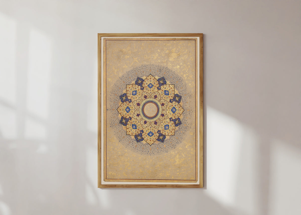Framed art print of Rosette Bearing the Names and Titles of Shah Jahan, Folio from the Shah Jahan Album, in a light wood frame on a sunlit white wall