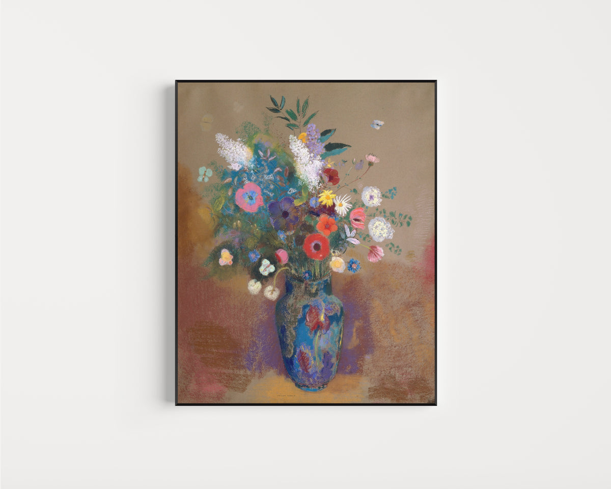 Framed art print of Bouquet of Flowers (Blue Vase) by Odilon Redon, in a slim black frame on a plain white wall