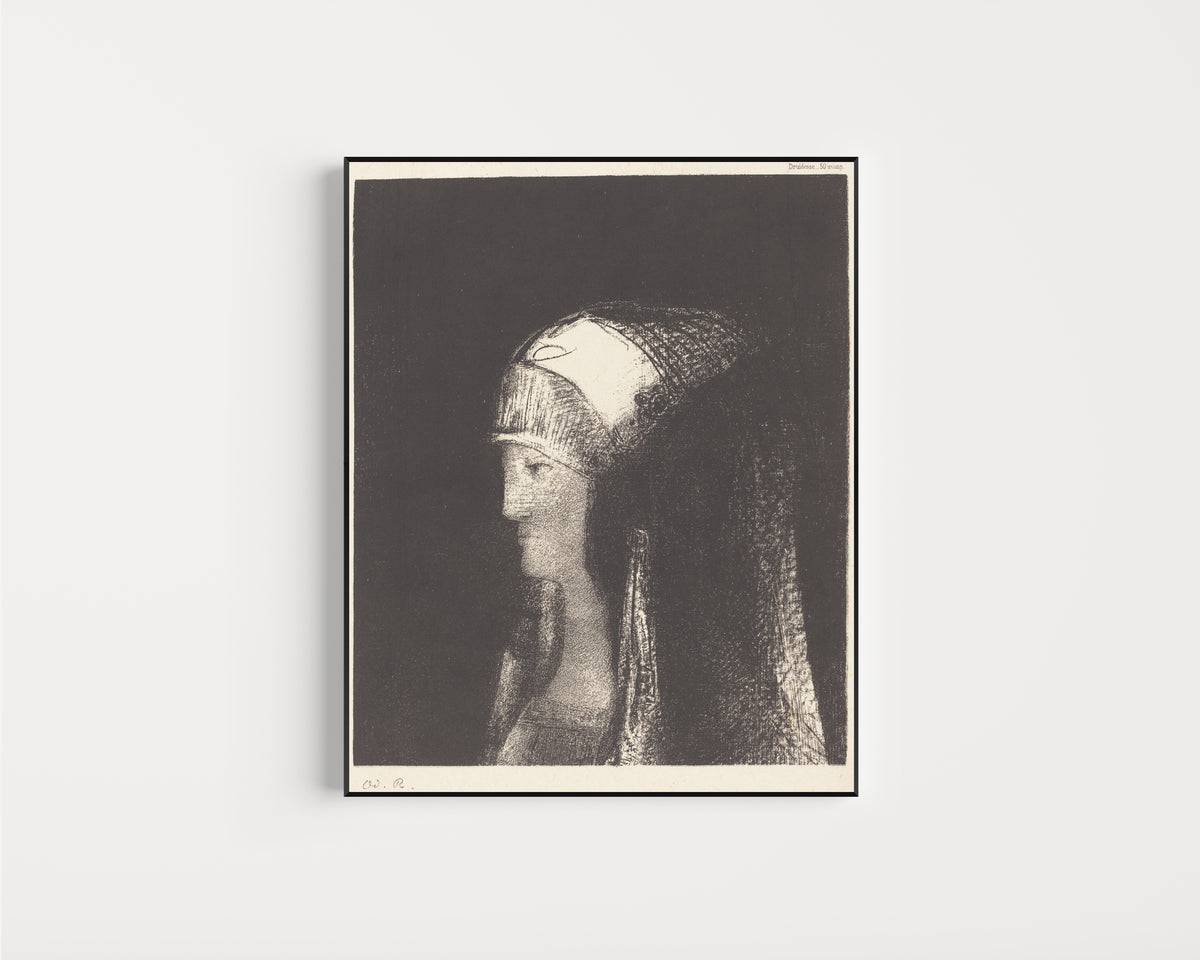 Framed art print of Druidess by Odilon Redon, in a slim black frame on a plain white wall