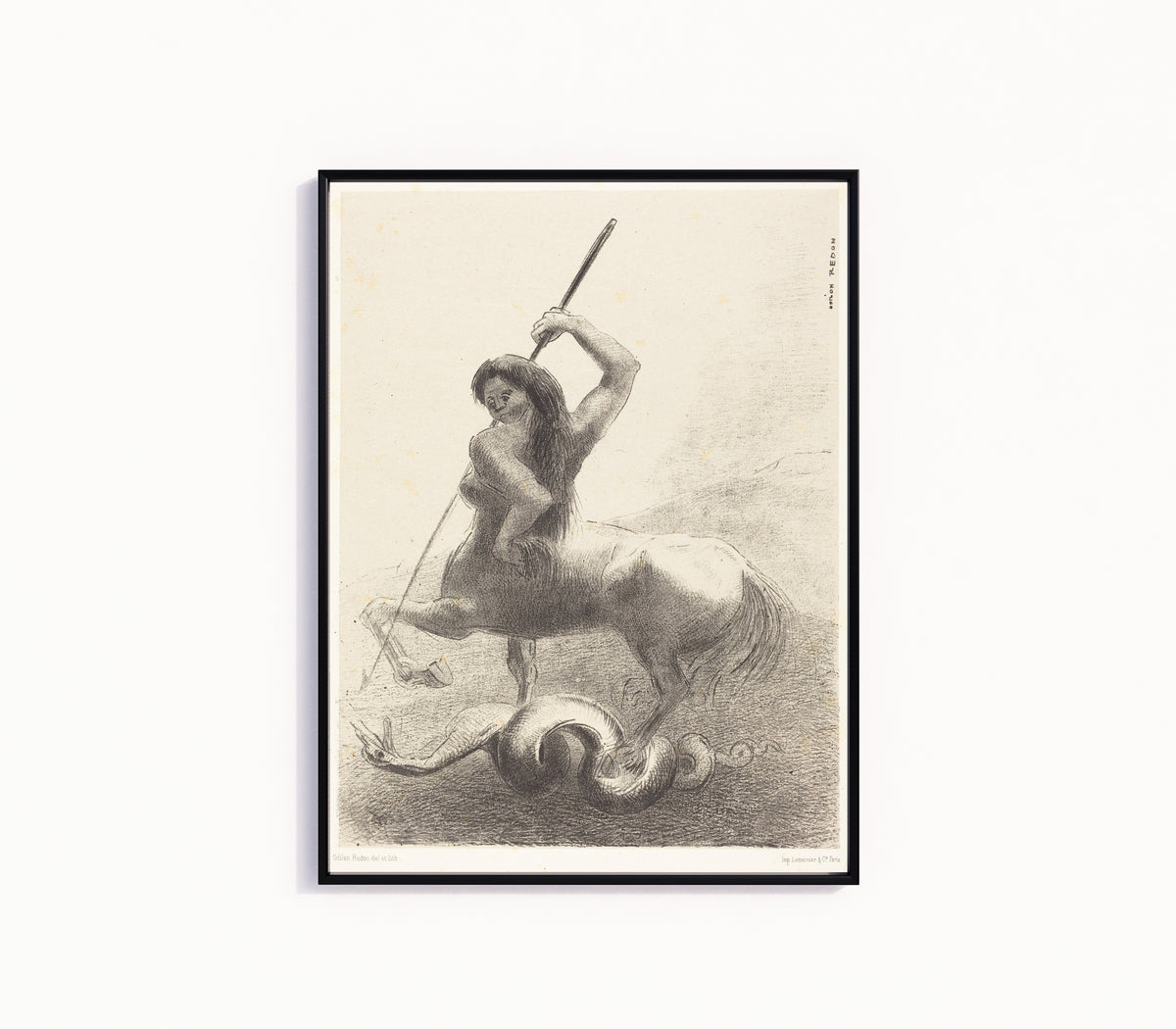 Framed art print of The Origins: There Were Struggles and Vain Victories by Odilon Redon, in a slim black frame on a plain white wall