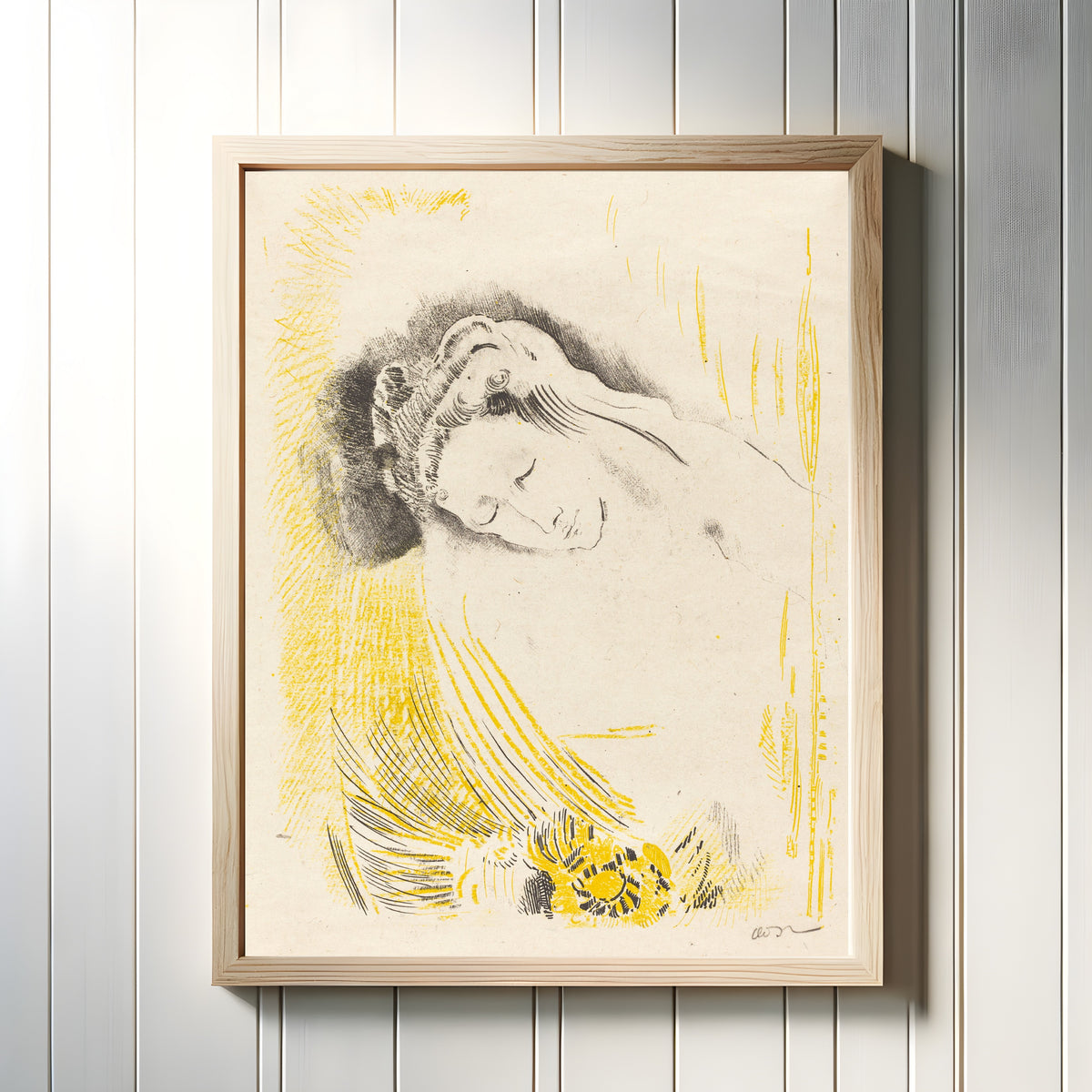 Framed art print of The Shulamite by Odilon Redon, in a light wood frame on a white panelled wall