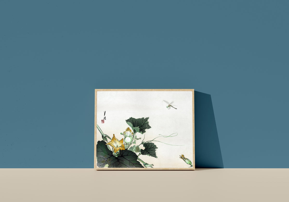 Framed art print of Kabocha ni tonbou (1890–1920) by Ogata Gekkō, in a light wood frame leaning on a blue wall