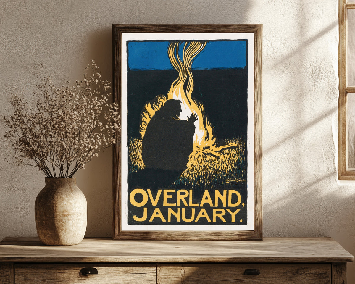Framed art print of Overland Monthly (January 1896) by Maynard Dixon, in a dark wood frame leaning on a rustic console beside dried flowers