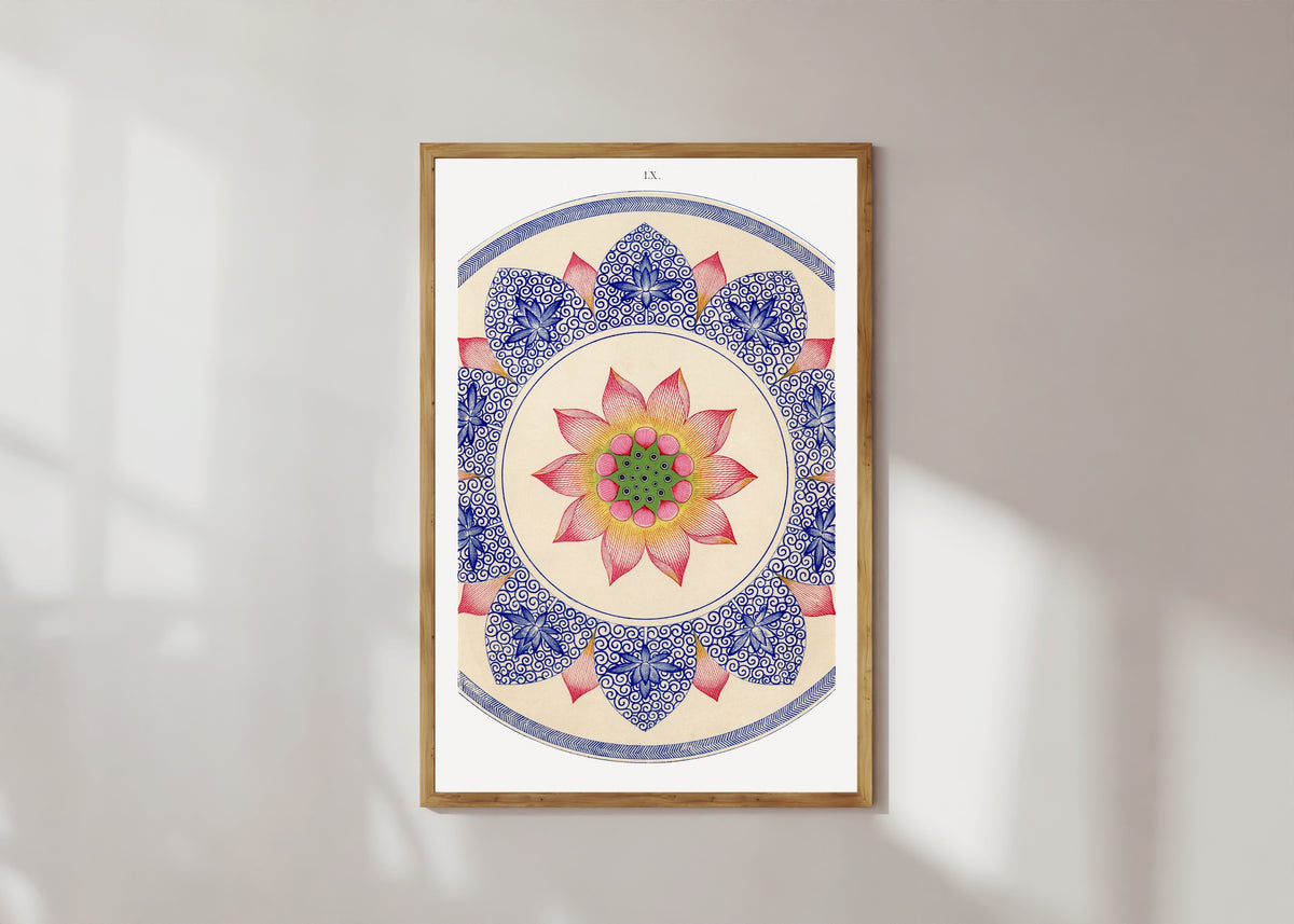 Framed art print of Examples of Chinese Ornament, Plate 60 by Owen Jones, in a light wood frame on a sunlit white wall