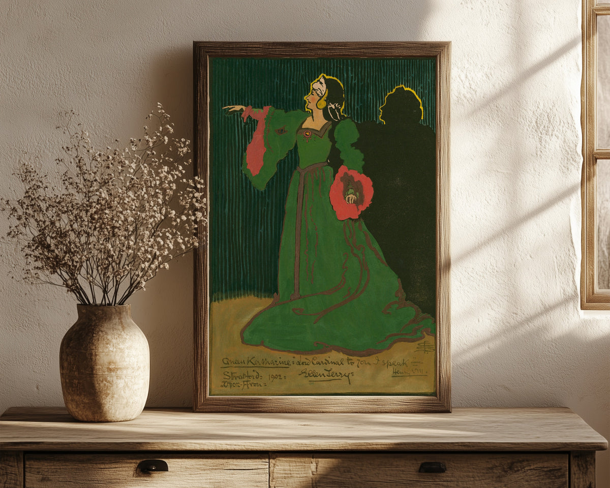 Framed art print of Henry VIII: Ellen Terry as Queen Katharine by Pamela Colman Smith, in a dark wood frame leaning on a rustic console beside dried flowers