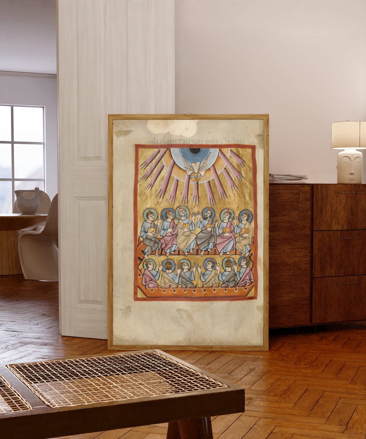 Framed art print of Pentecost (Rays from Heaven), in a light wood frame leaning in a warm room with a parquet floor