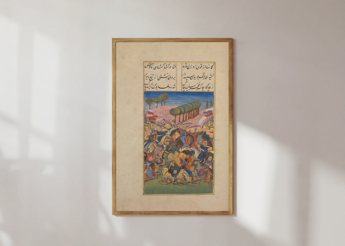 Framed art print of Khusrau and Shirin: A Battle Scene by Suzi, in a light wood frame on a sunlit white wall