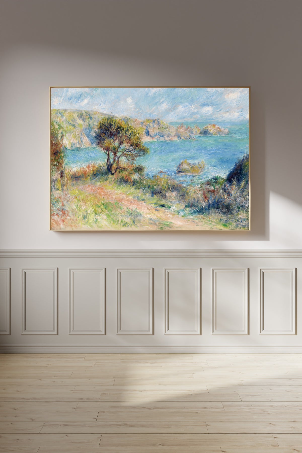 View at Guernsey by Pierre-Auguste Renoir — in a black frame on a pale wall
