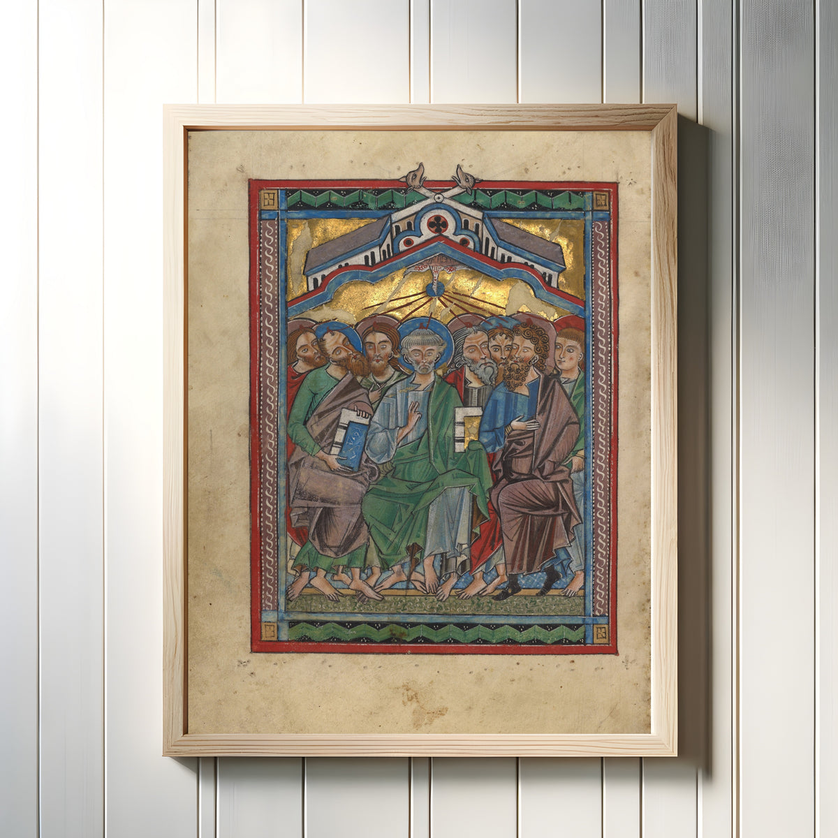 Framed art print of Psalter: Pentecost, in a light wood frame on a white panelled wall