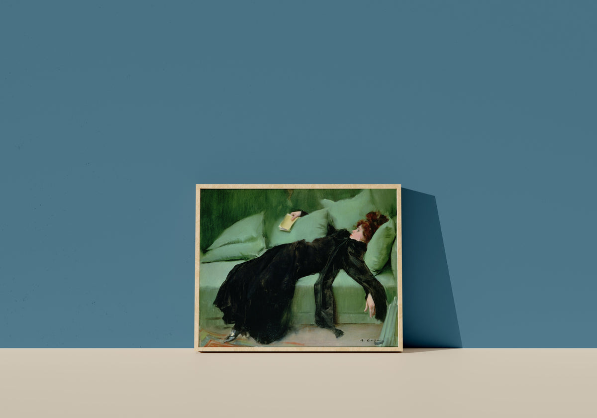 Framed art print of Decadent Young Woman by Ramon Casas, in a light wood frame leaning on a blue wall