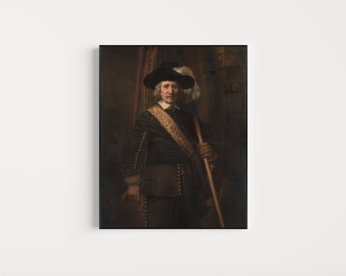 Framed art print of The Standard Bearer (probably Floris Soop, 1604–1657) by Rembrandt van Rijn, in a slim black frame on a plain white wall