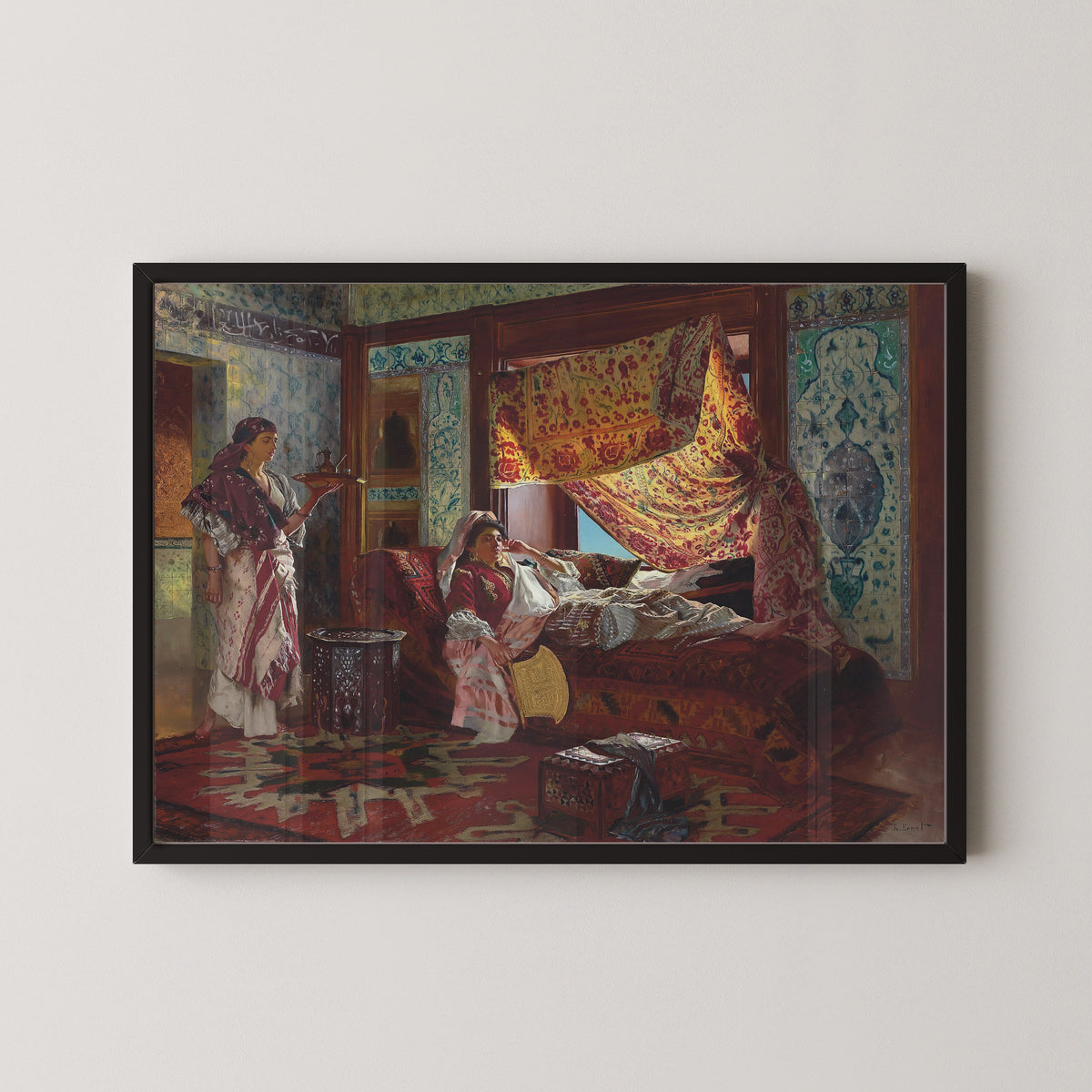 Taking Tea in the Harem by Rudolf Ernst — in a black frame on a pale wall