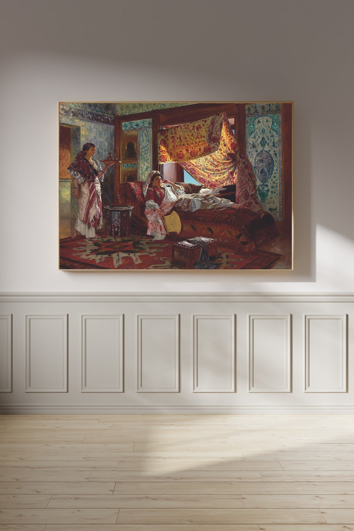 Taking Tea in the Harem by Rudolf Ernst — framed on a panelled wall in afternoon light