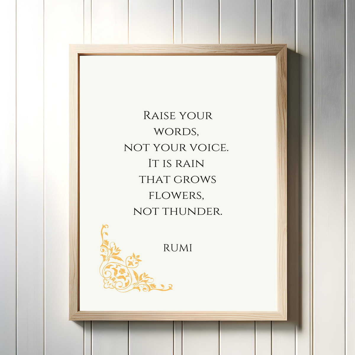 Framed art print of Rain and Thunder by Rumi, in a light wood frame on a white panelled wall