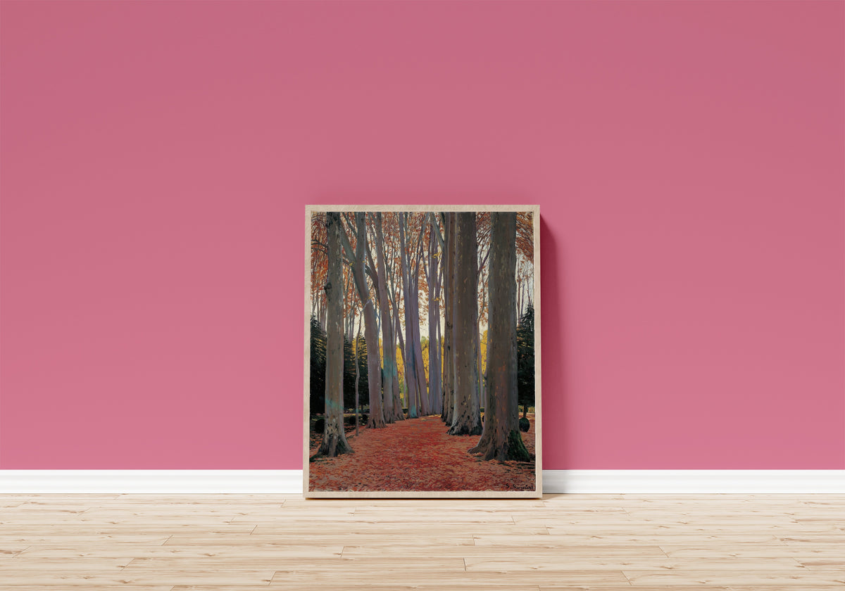 Framed art print of Avenue of Plane Trees by Santiago Rusiñol, in a light wood frame leaning on a pink wall above a wooden floor