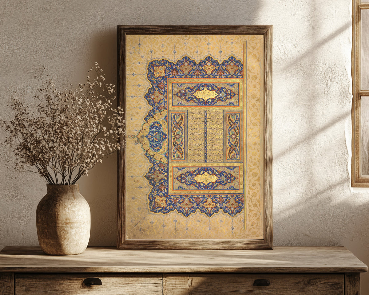 Framed art print of Illuminated Frontispiece of a Manuscript… by Sultan 'Ali al-Mashhadi, in a dark wood frame leaning on a rustic console beside dried flowers