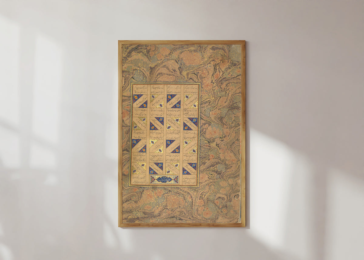 Framed art print of Page of Calligraphy from a Mantiq al-Tayr (Diagonal Verse Panels) by Sultan 'Ali al-Mashhadi, in a light wood frame on a sunlit white wall