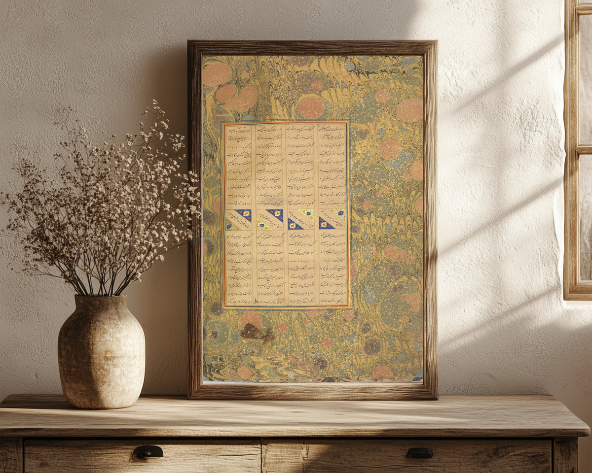 Framed art print of Page of Calligraphy from a Mantiq… by Sultan 'Ali al-Mashhadi, in a dark wood frame leaning on a rustic console beside dried flowers