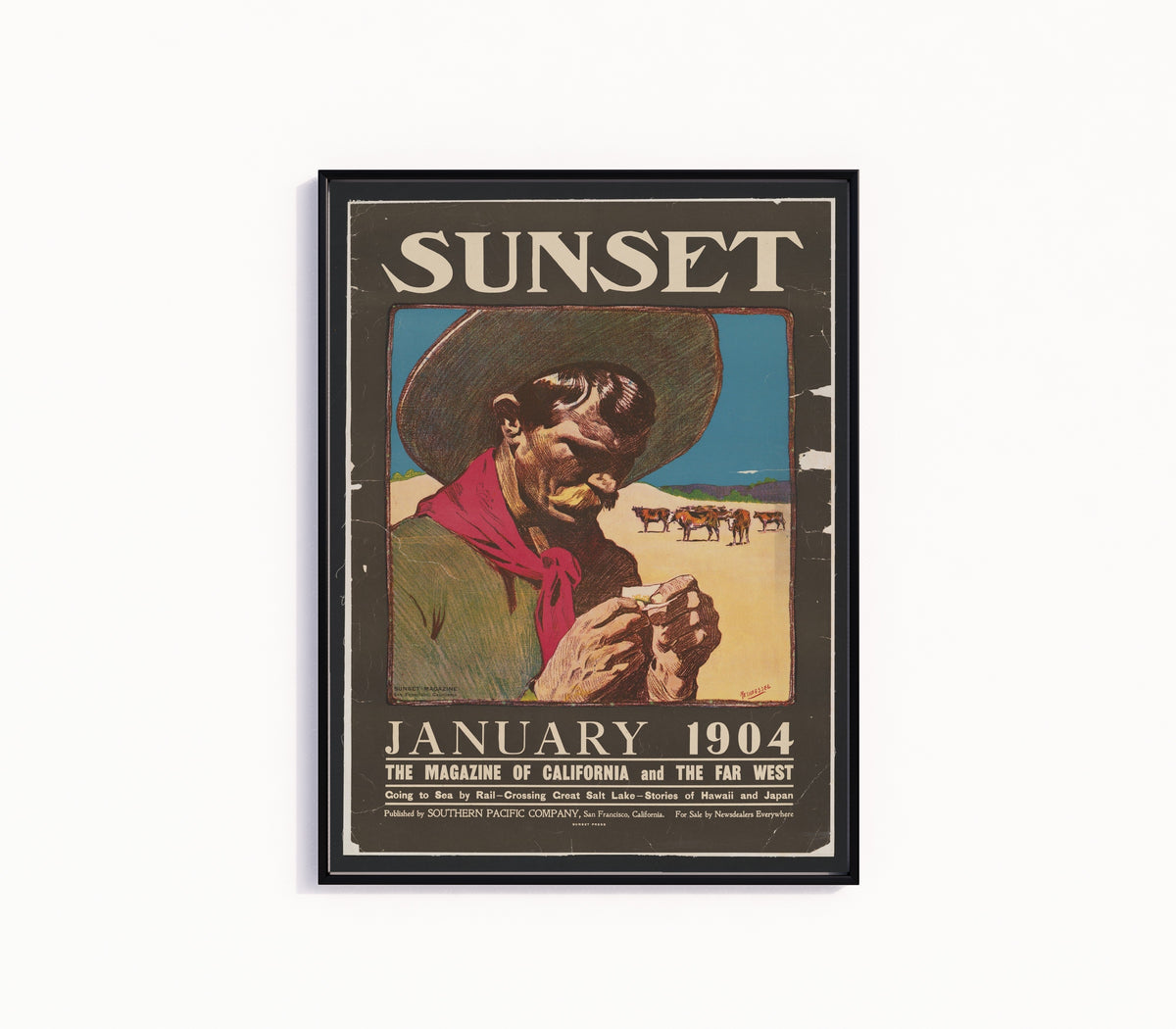 Framed art print of Sunset Magazine Cowboy (January 1904) by Maynard Dixon, in a slim black frame on a plain white wall