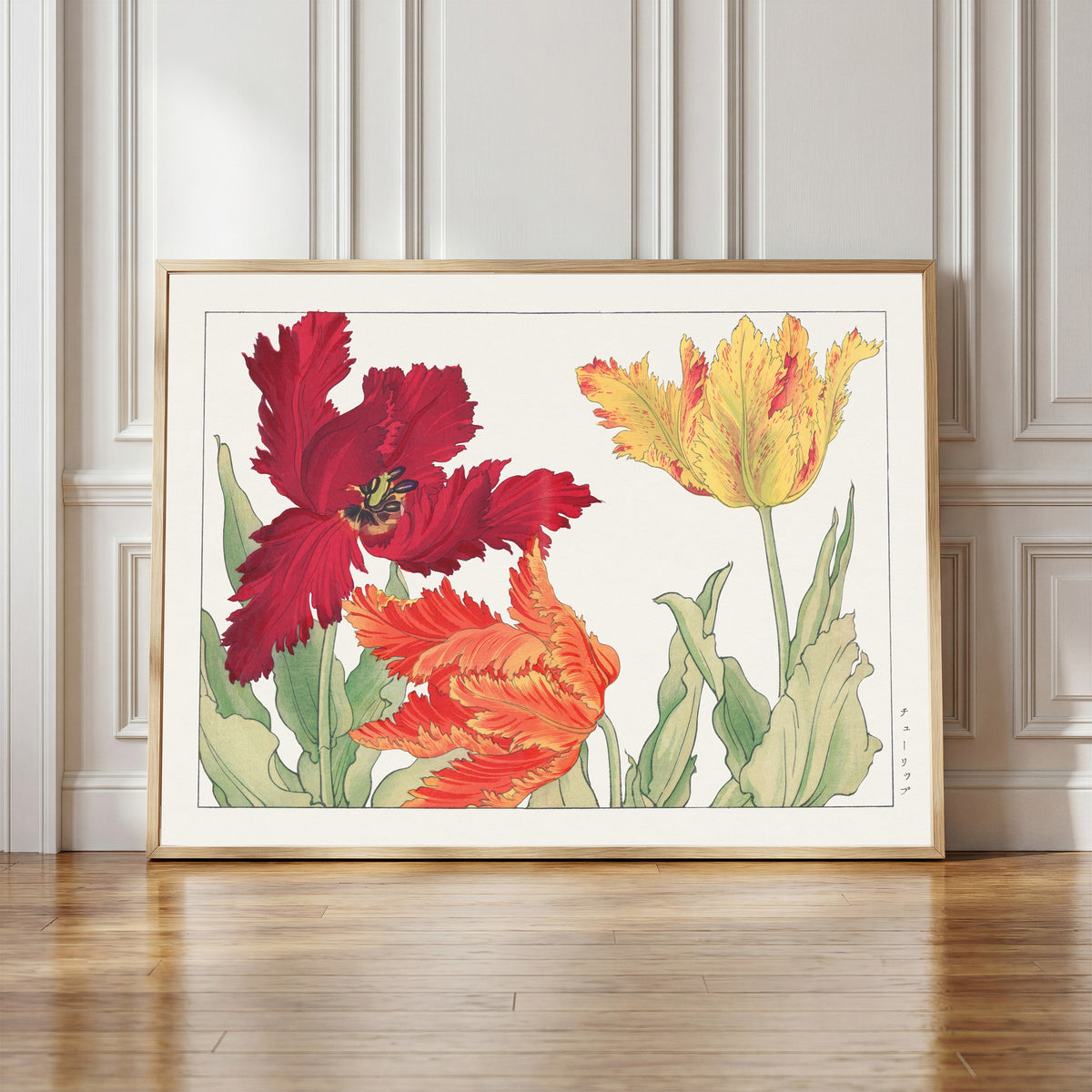 Framed art print of Parrot tulip by Tanigami Kōnan, in a light wood frame leaning against a panelled white wall
