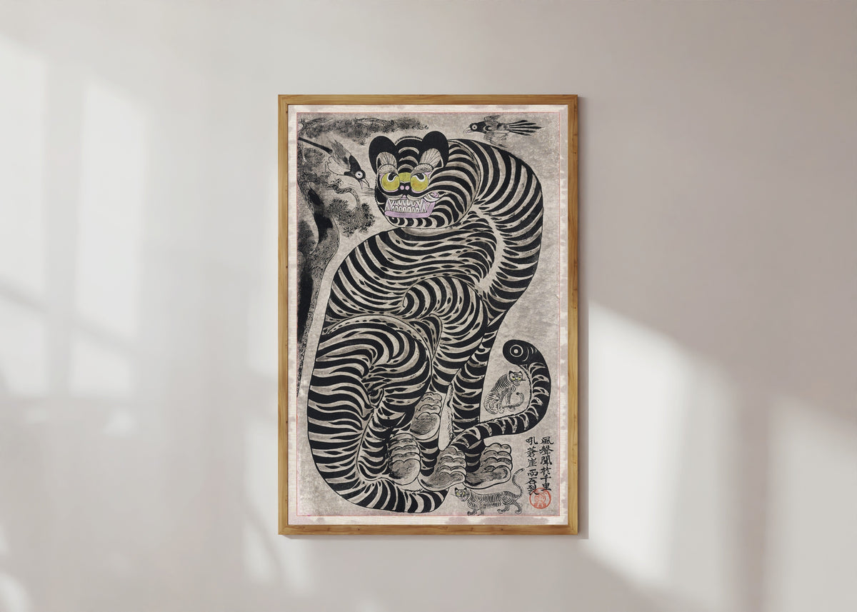 Framed art print of The Talismanic Tiger by Japanese Art, in a light wood frame on a sunlit white wall