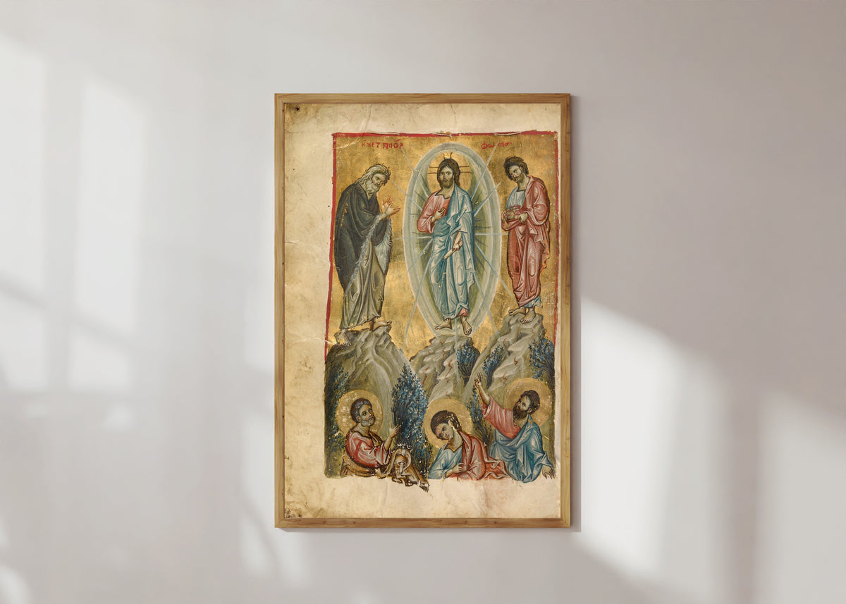 Framed art print of The Transfiguration, in a light wood frame on a sunlit white wall