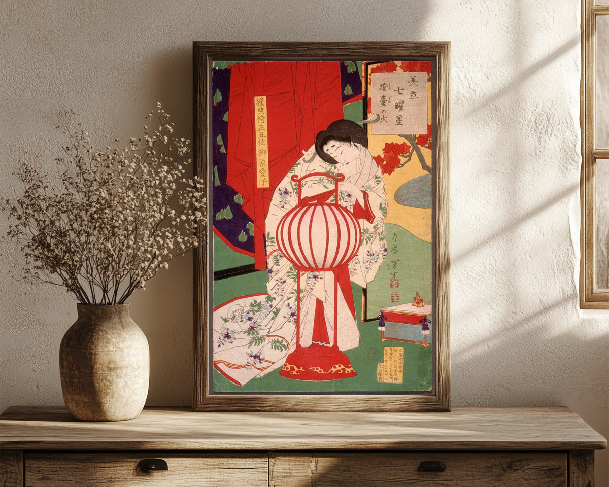 Framed art print of Full Moon by Tsukioka Yoshitoshi, in a dark wood frame leaning on a rustic console beside dried flowers