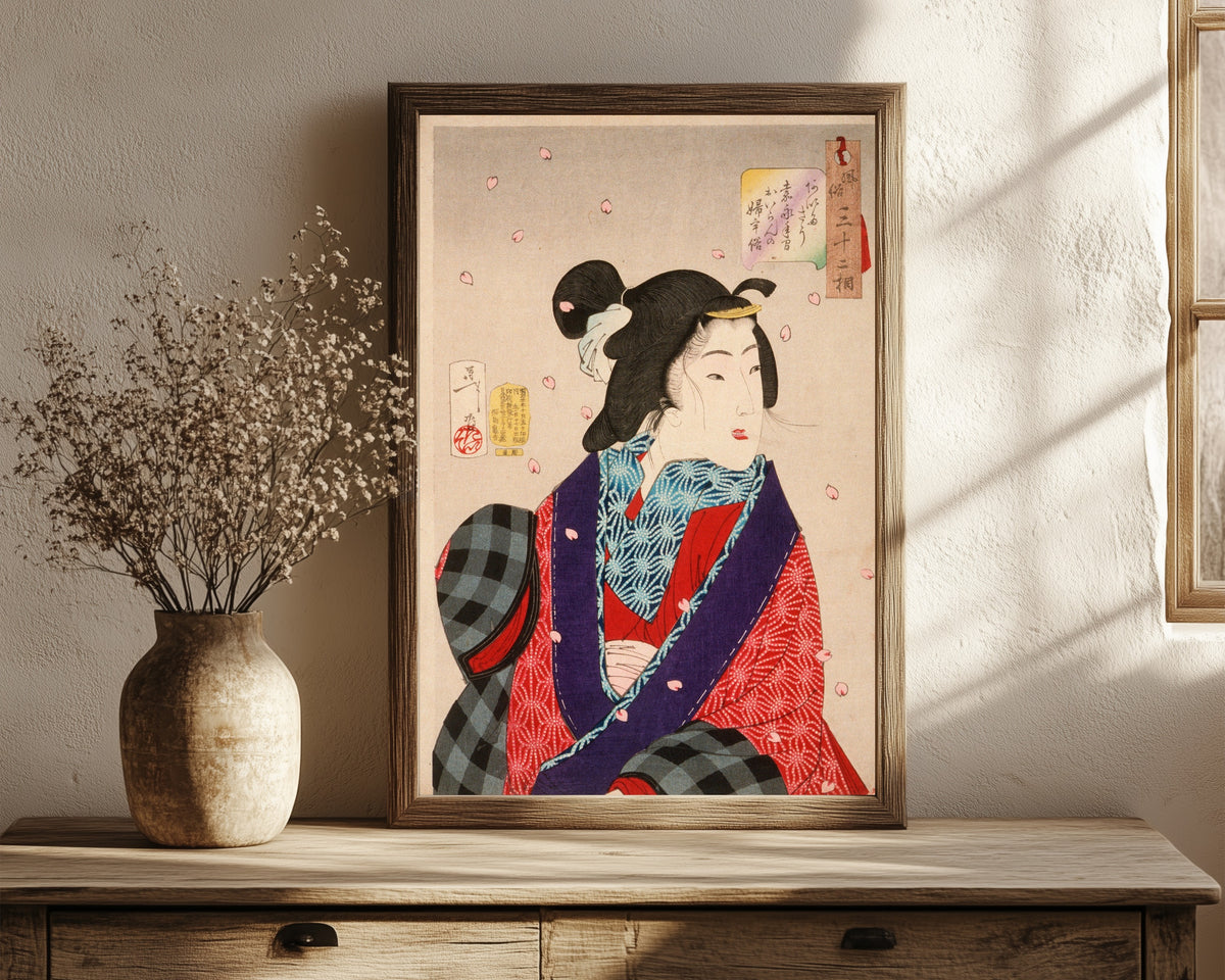 Framed art print of Wanting to Meet Someone: A Courtesan of the… by Tsukioka Yoshitoshi, in a dark wood frame leaning on a rustic console beside dried flowers