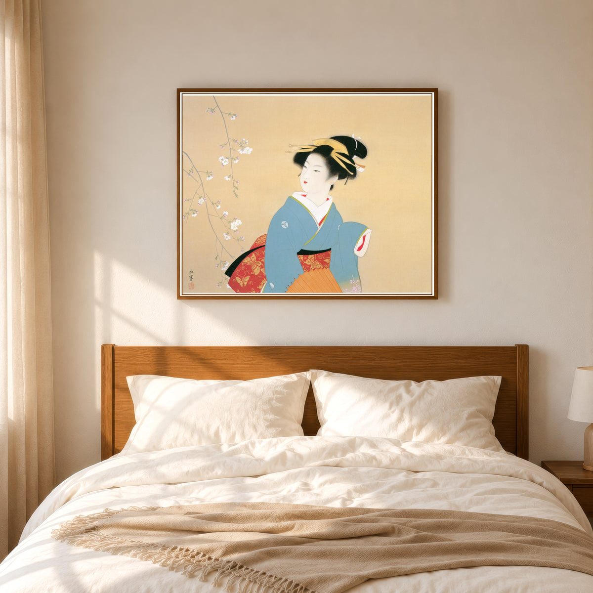 Framed art print of Cherry Blossom Viewing by Uemura Shōen, in a slim wood frame above a bed in a sunlit bedroom