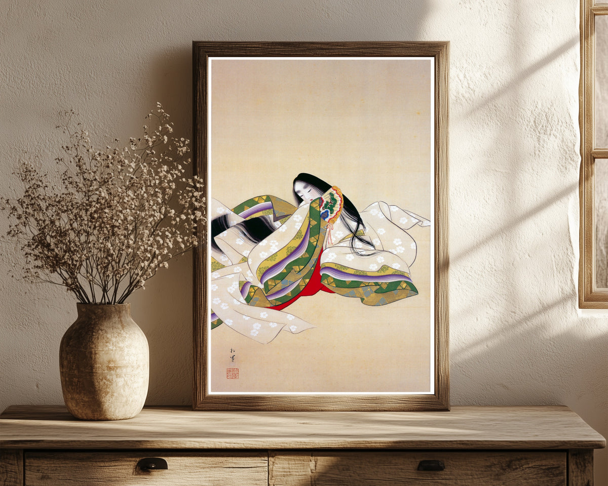 Framed art print of Jōrō (Court Lady) by Uemura Shōen, in a dark wood frame leaning on a rustic console beside dried flowers