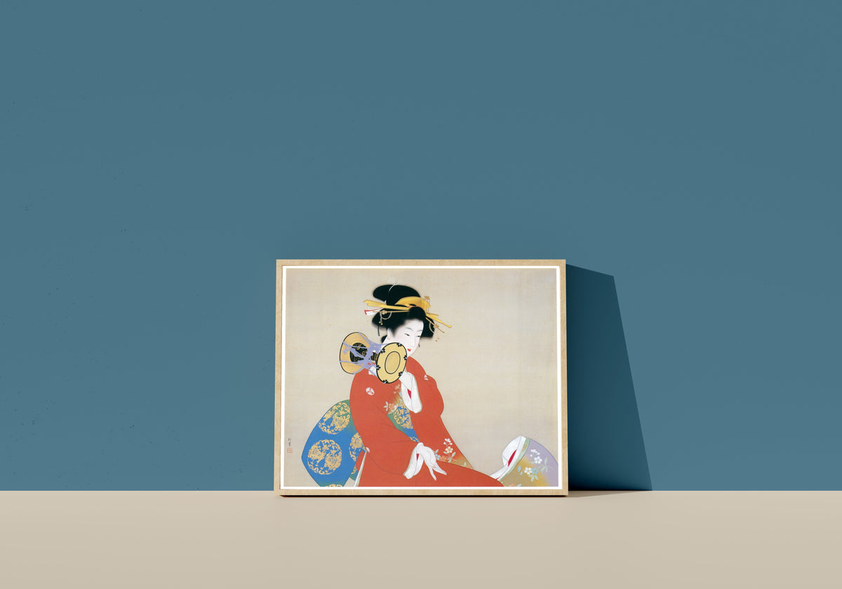 Framed art print of Sound of the Drum (Tsuzumi no ne) by Uemura Shōen, in a light wood frame leaning on a blue wall