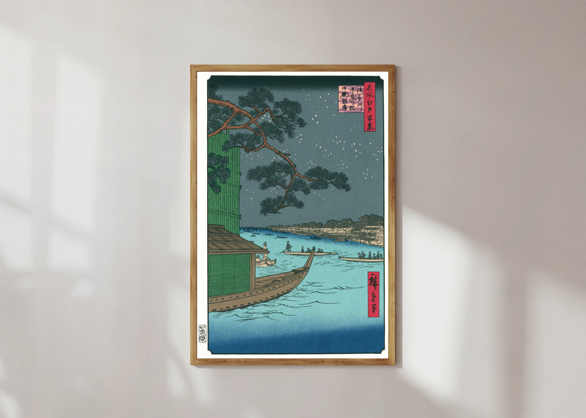 Framed art print of 100 Views of Edo: Asakusa River, Shubi Pine, Onmayagashi by Utagawa Hiroshige, in a light wood frame on a sunlit white wall