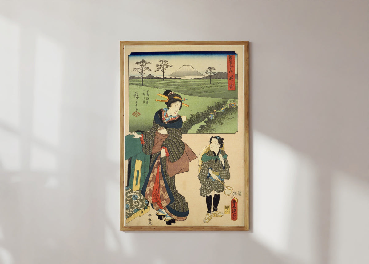 Framed art print of Fifty-three Stations by Two Brushes: Hodogaya by Utagawa Hiroshige & Utagawa Kunisada, in a light wood frame on a sunlit white wall