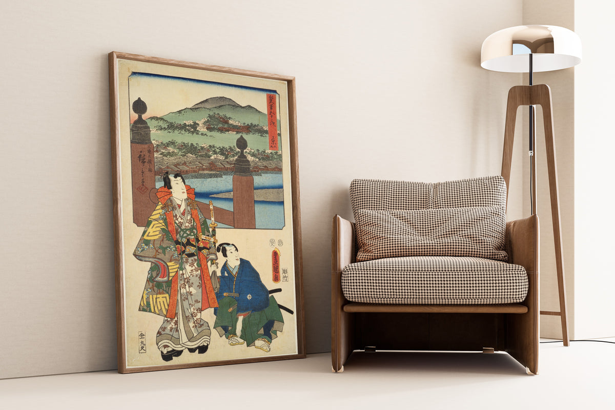 Fifty-three Stations by Two Brushes: Kyoto (Keishi) by Utagawa Hiroshige & Utagawa Kunisada — framed and leaning against a wall beside an armchair and a floor
