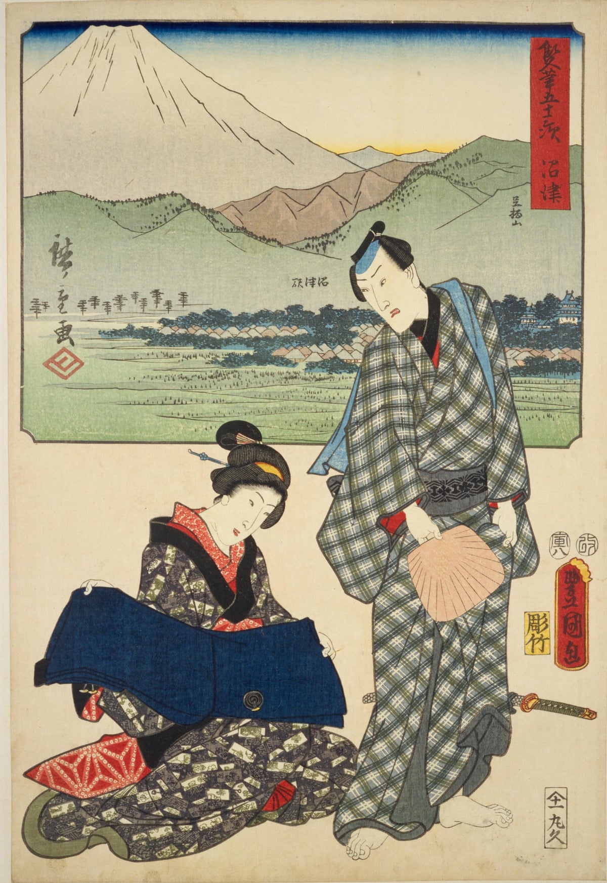 Fifty-three Stations by Two Brushes: Numazu by Utagawa Hiroshige & Utagawa Kunisada — A couple pause on a road below snow-capped Mount Fuji