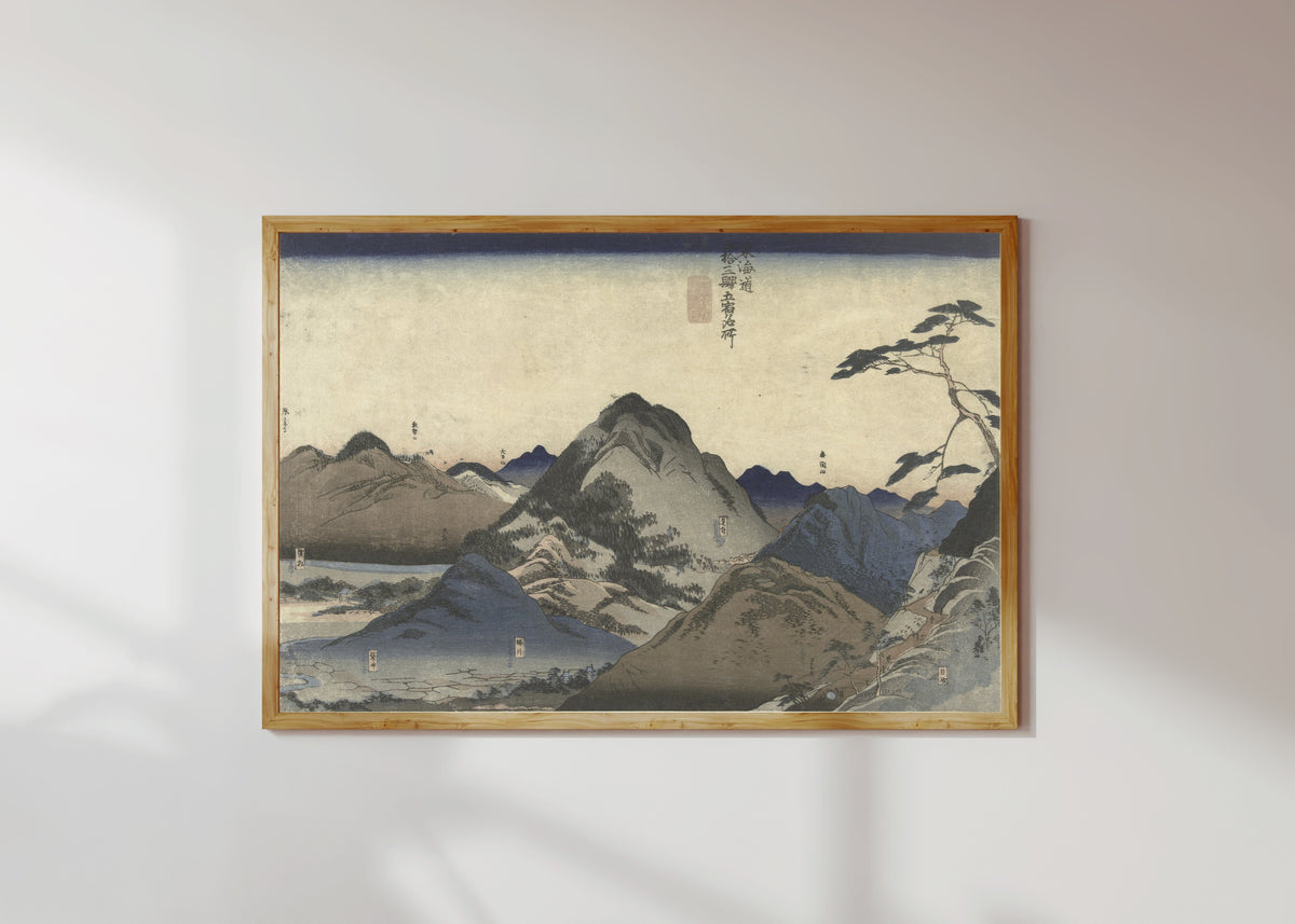 Framed art print of Nissaka to Hamamatsu (Tōkaidō) by Utagawa Kuniyoshi, in a light wood frame on a sunlit white wall