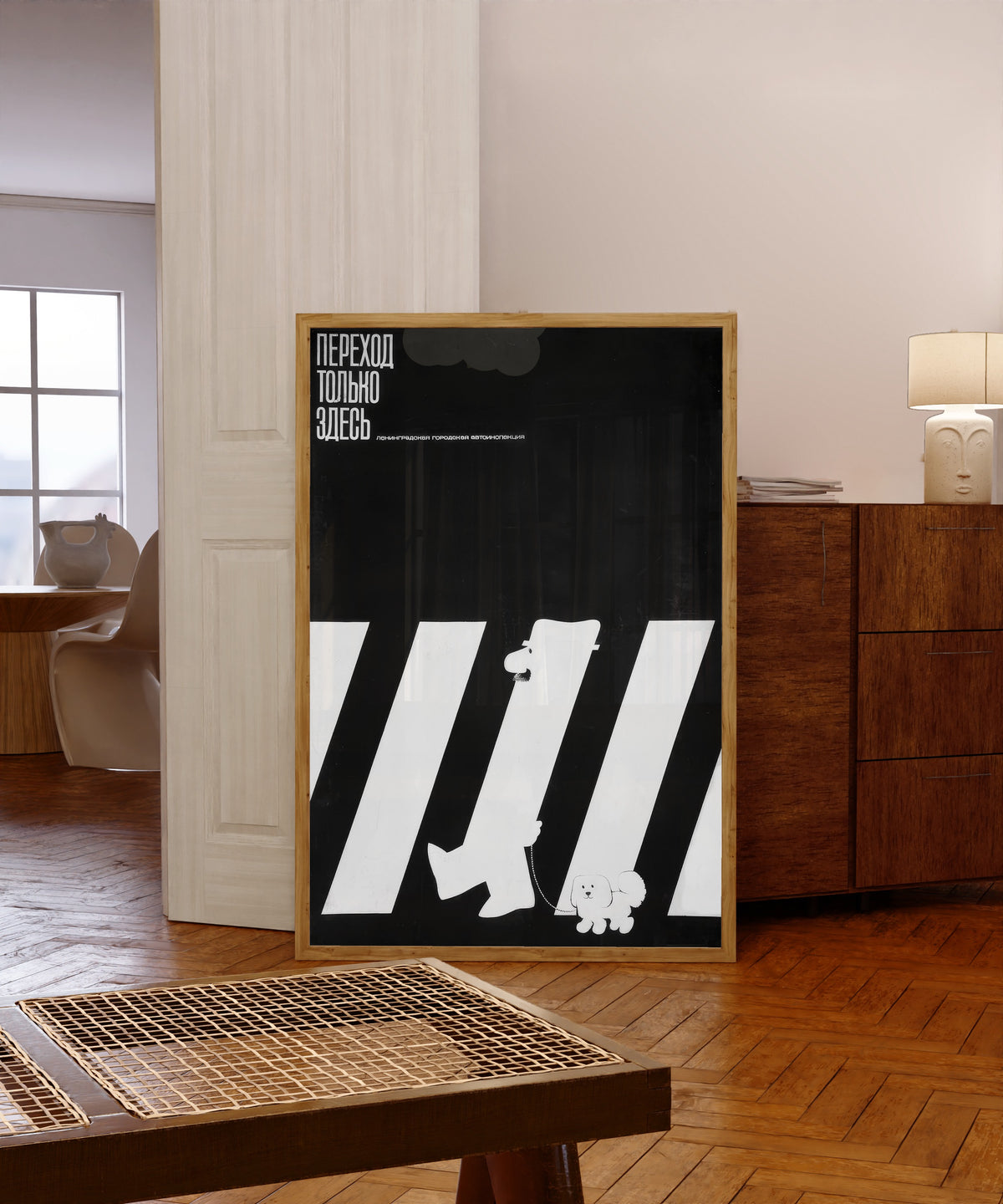 Framed art print of Leningrad Traffic Police by V. Strimaitis, in a light wood frame leaning in a warm room with a parquet floor
