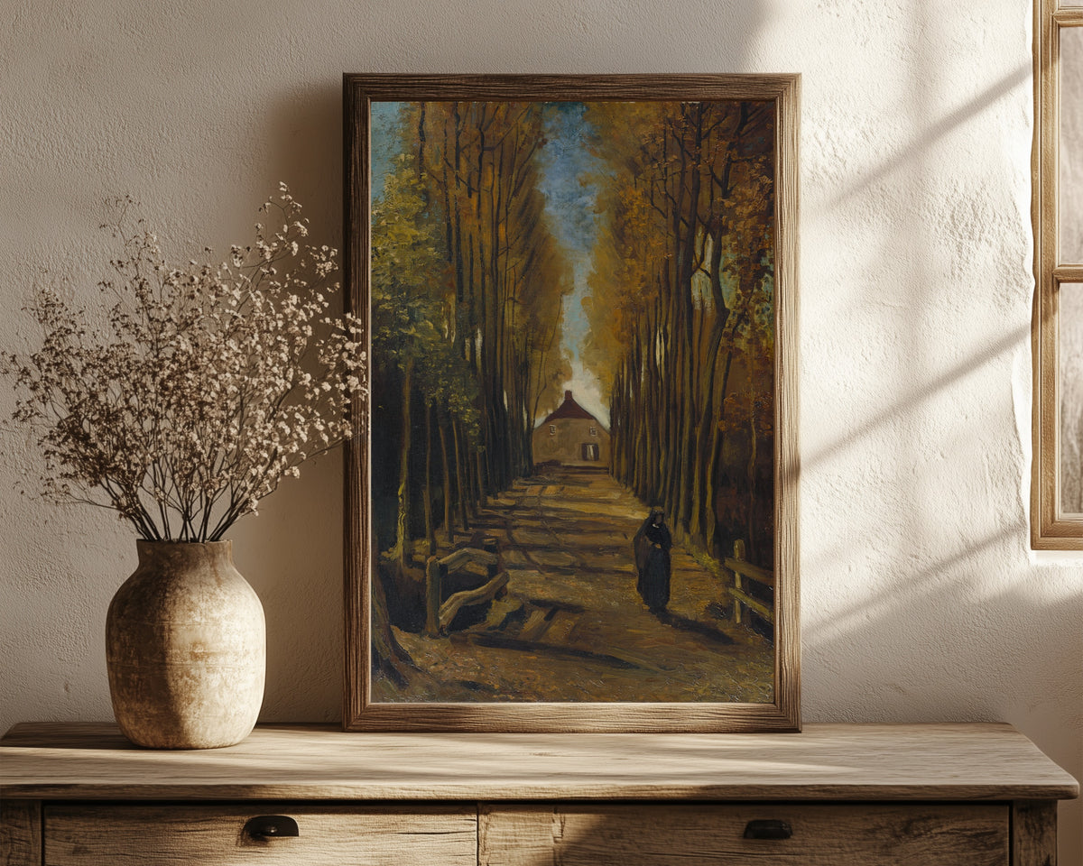 Framed art print of Avenue of Poplars in Autumn by Vincent van Gogh, in a dark wood frame leaning on a rustic console beside dried flowers