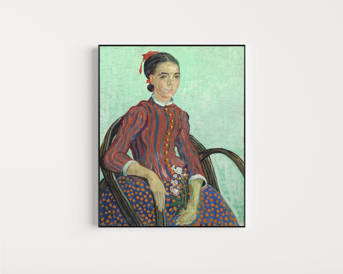Framed art print of La Mousmé by Vincent van Gogh, in a slim black frame on a plain white wall