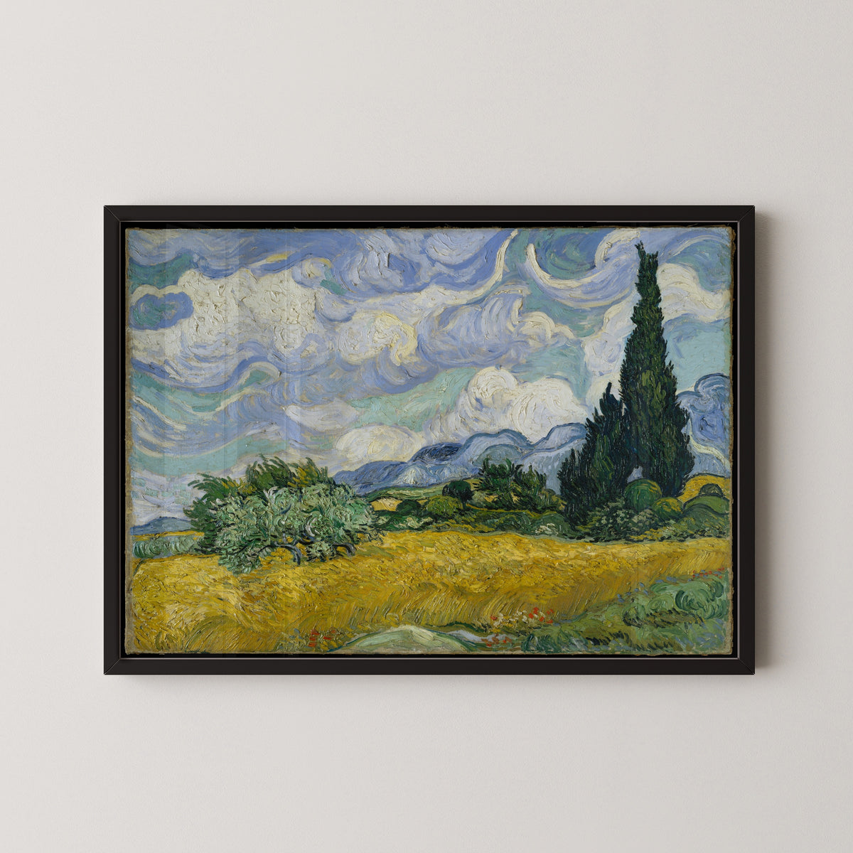 Wheat Field with Cypresses by Vincent van Gogh — shown framed on a wall