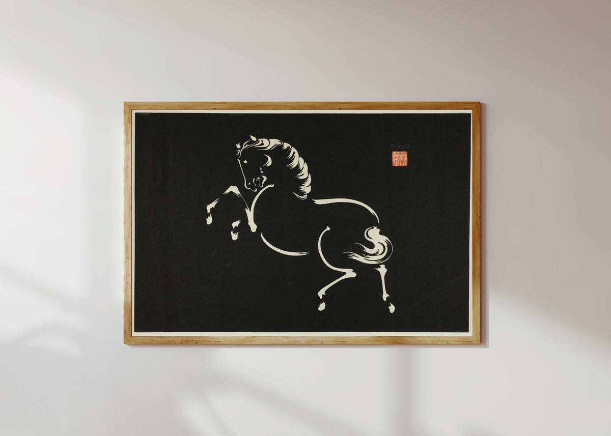 Framed art print of Rearing Horse by Wakyosai, in a light wood frame on a sunlit white wall