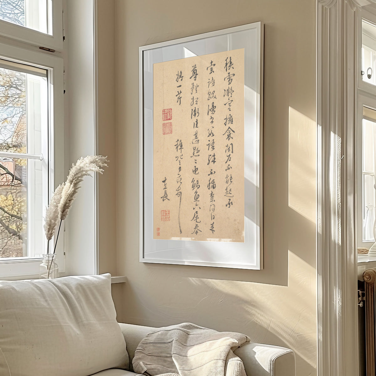 Letter by Wang Zhideng — framed in a sunlit living room above a sofa