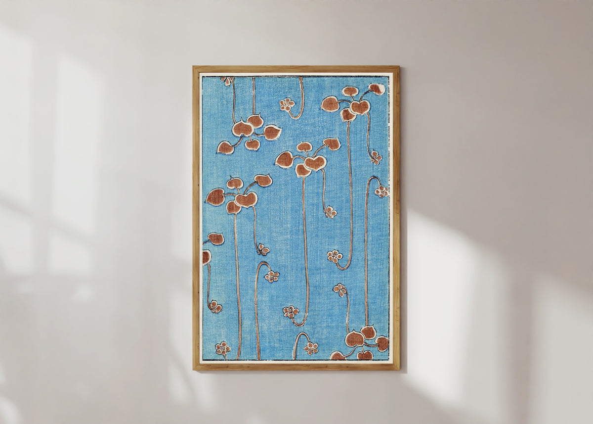 Framed art print of Vine Illustration by Watanabe Seitei, in a light wood frame on a sunlit white wall