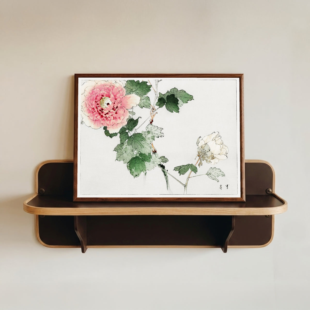 Framed art print of Tree Peony by Watanabe Seitei, in a dark wood frame resting on a wall shelf