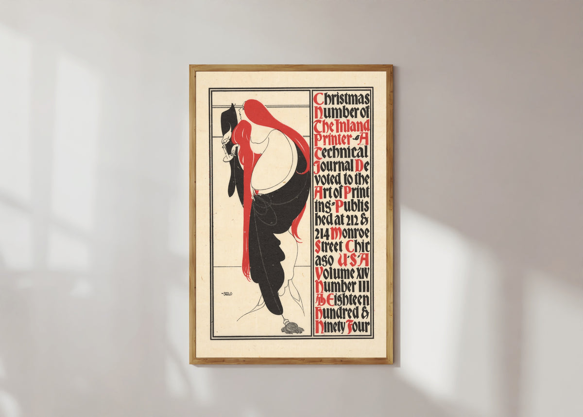 Framed art print of The Inland Printer, Christmas Number, 1894 by Will Bradley, in a light wood frame on a sunlit white wall